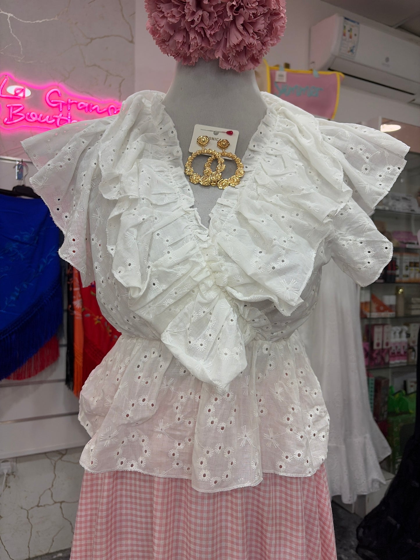 Blusa perforada volante